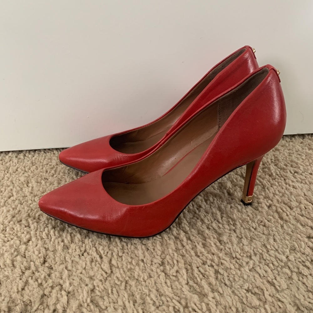 Red Aldo heels